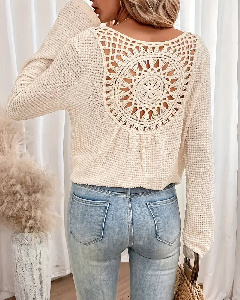Chic Knit Sweater with a Distinctive Back Design