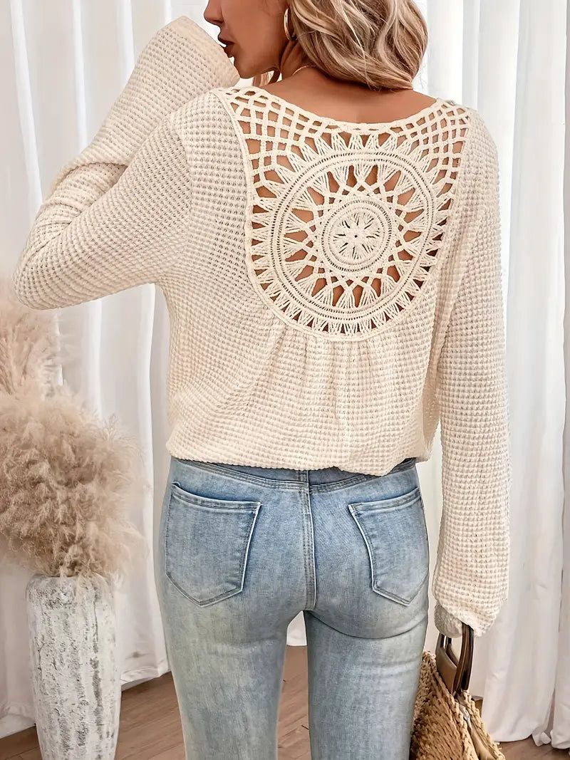 Chic Knit Sweater with a Distinctive Back Design