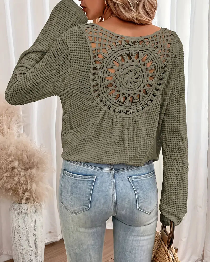 Chic Knit Sweater with a Distinctive Back Design