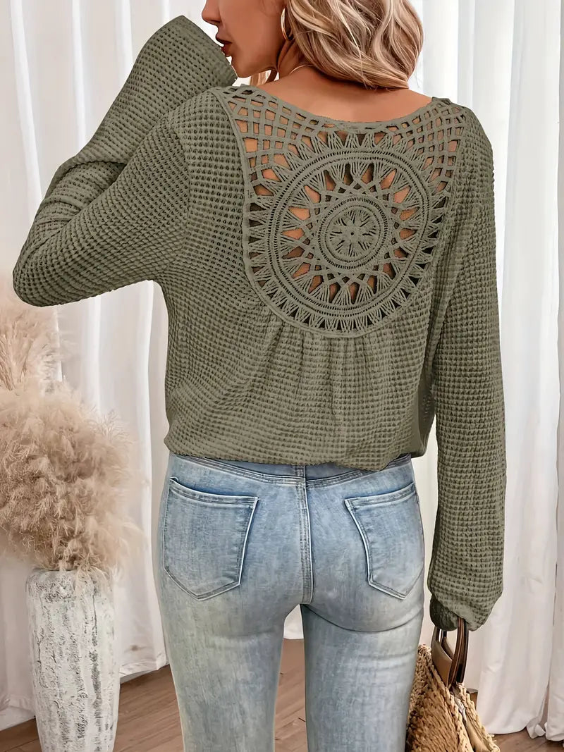 Chic Knit Sweater with a Distinctive Back Design