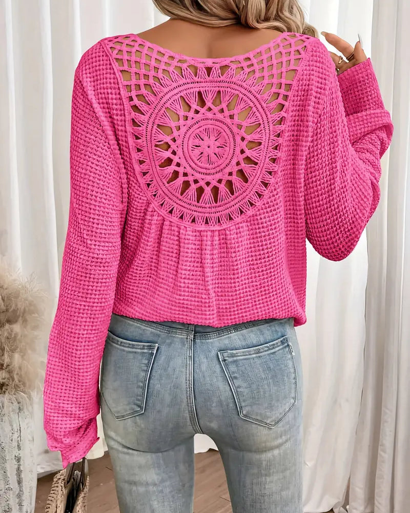 Chic Knit Sweater with a Distinctive Back Design