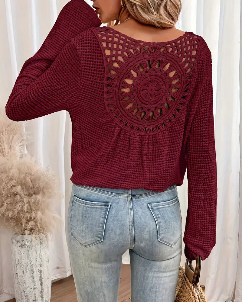 Chic Knit Sweater with a Distinctive Back Design