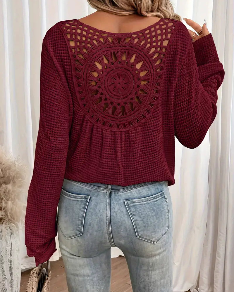 Chic Knit Sweater with a Distinctive Back Design