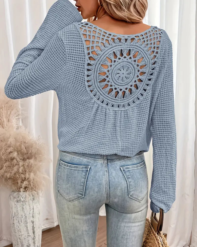 Chic Knit Sweater with a Distinctive Back Design