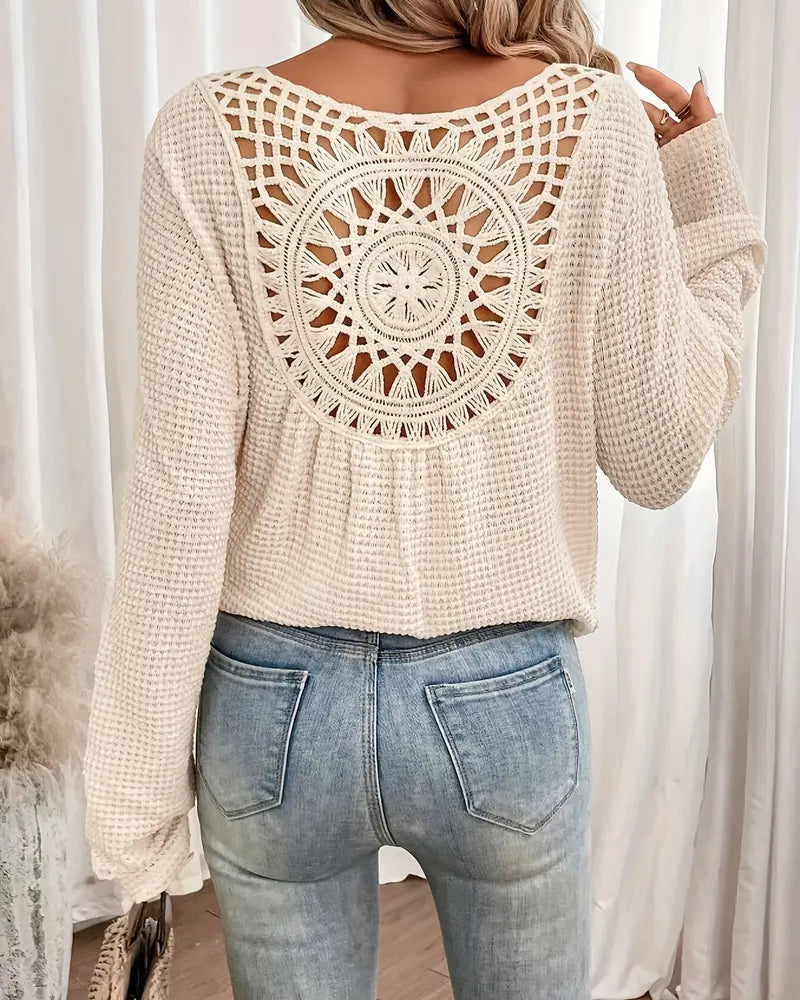 Chic Knit Sweater with a Distinctive Back Design