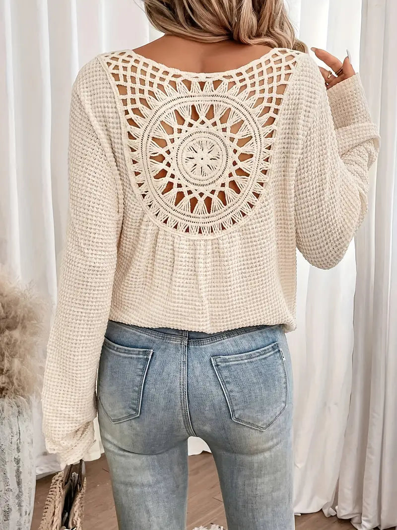 Chic Knit Sweater with a Distinctive Back Design