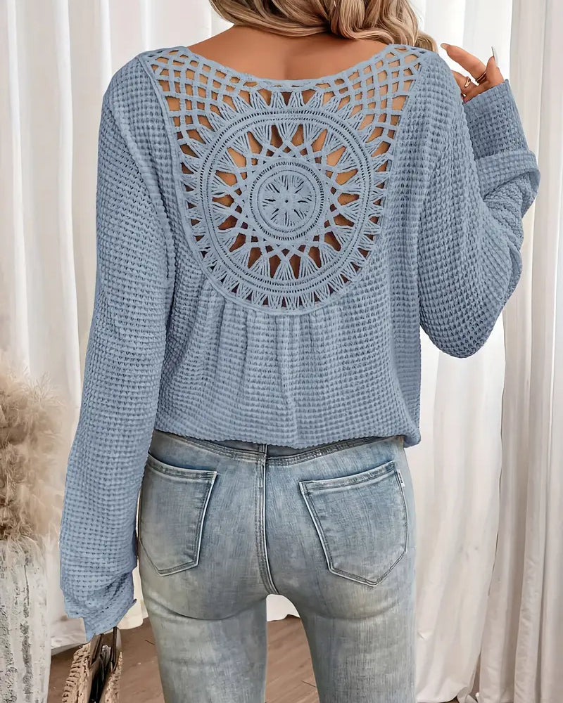 Chic Knit Sweater with a Distinctive Back Design