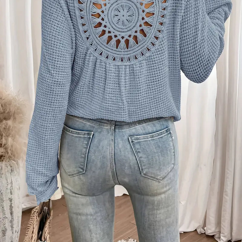 Chic Knit Sweater with a Distinctive Back Design