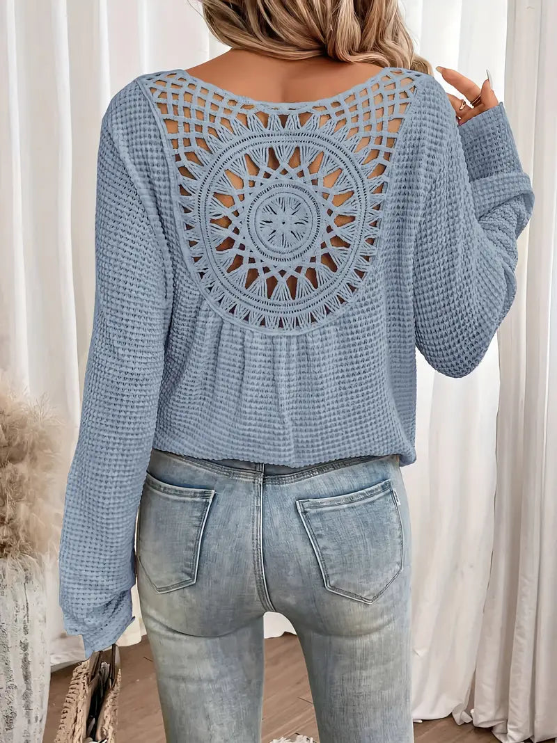 Chic Knit Sweater with a Distinctive Back Design