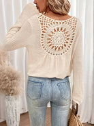 Chic Knit Sweater with a Distinctive Back Design