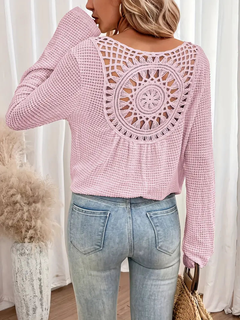 Chic Knit Sweater with a Distinctive Back Design