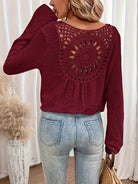 Chic Knit Sweater with a Distinctive Back Design
