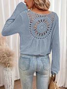 Chic Knit Sweater with a Distinctive Back Design