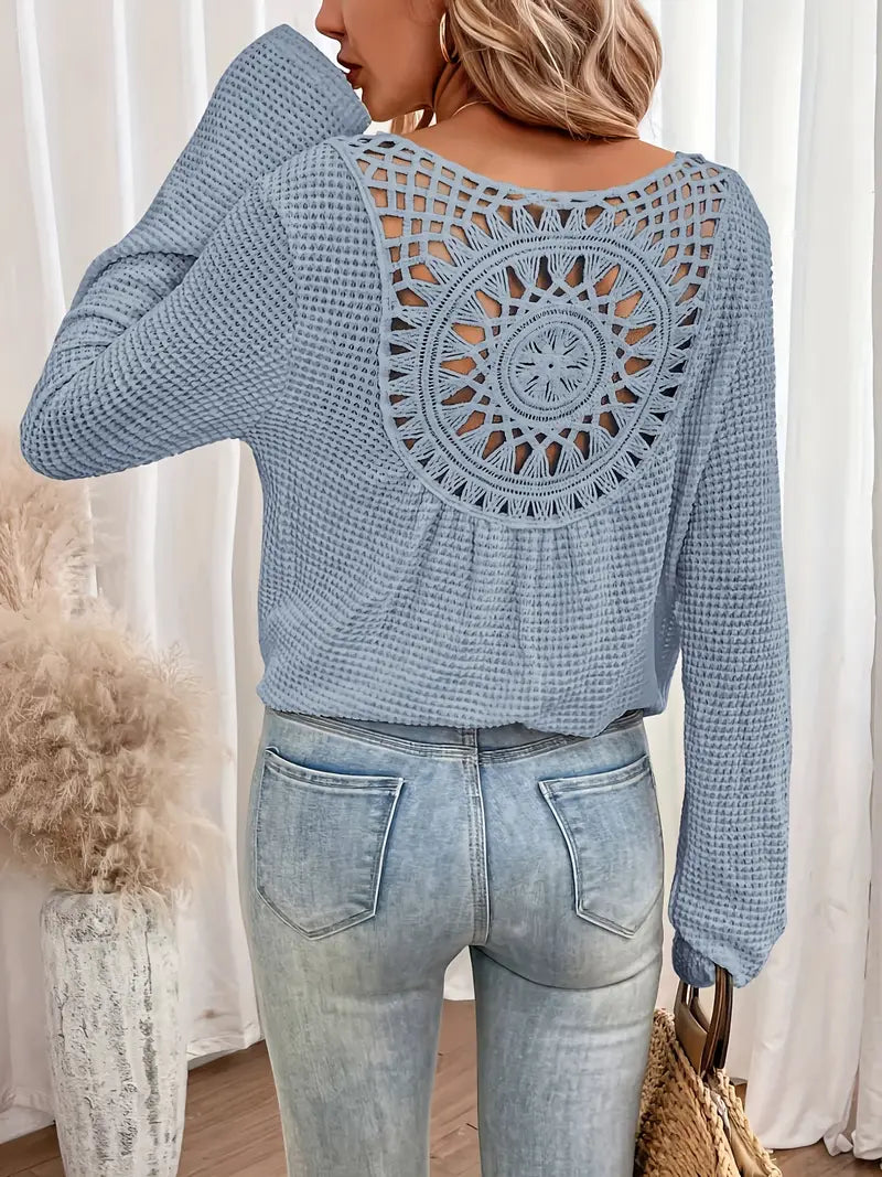 Chic Knit Sweater with a Distinctive Back Design