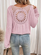 Chic Knit Sweater with a Distinctive Back Design